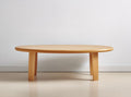 Round walnut coffee table with cross legs 120 cm diameter for living room